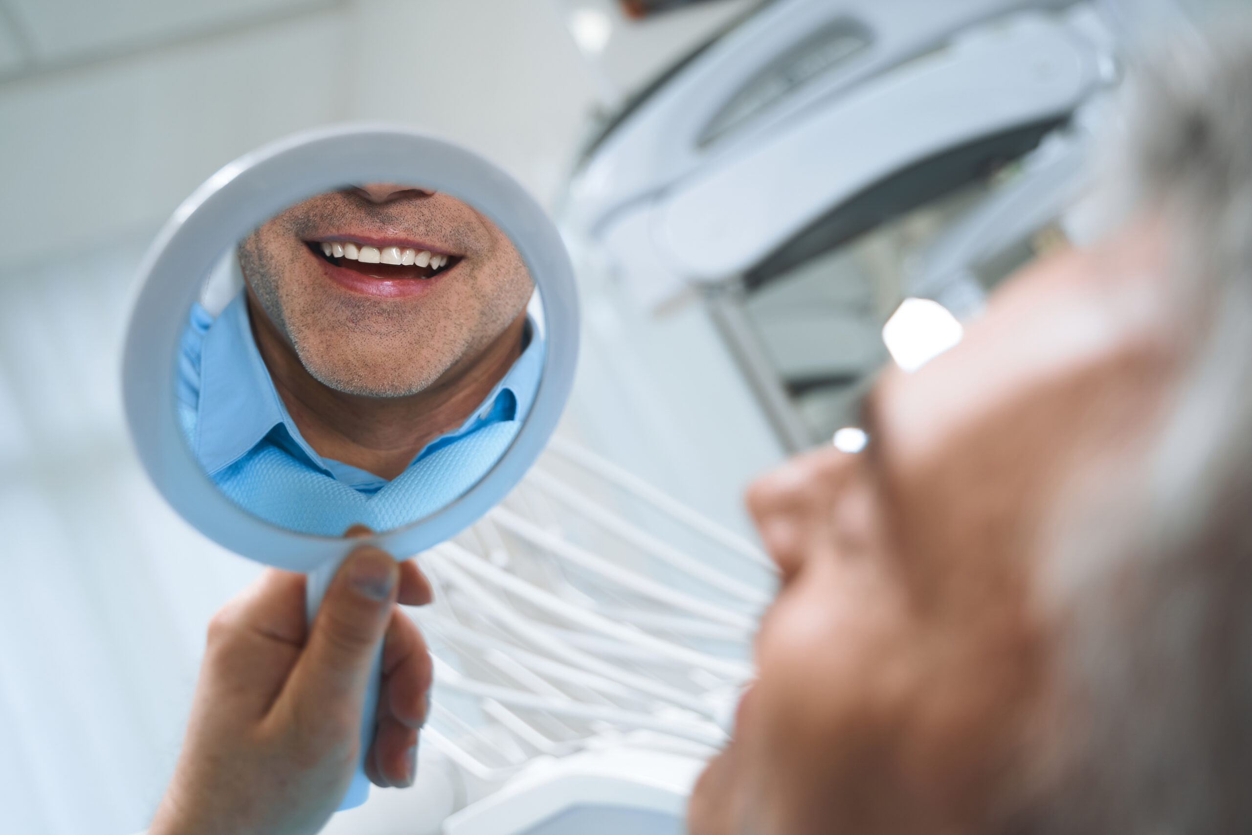Patient smiling after same-day dental implants at North Creek Dental Care in Tinley Park