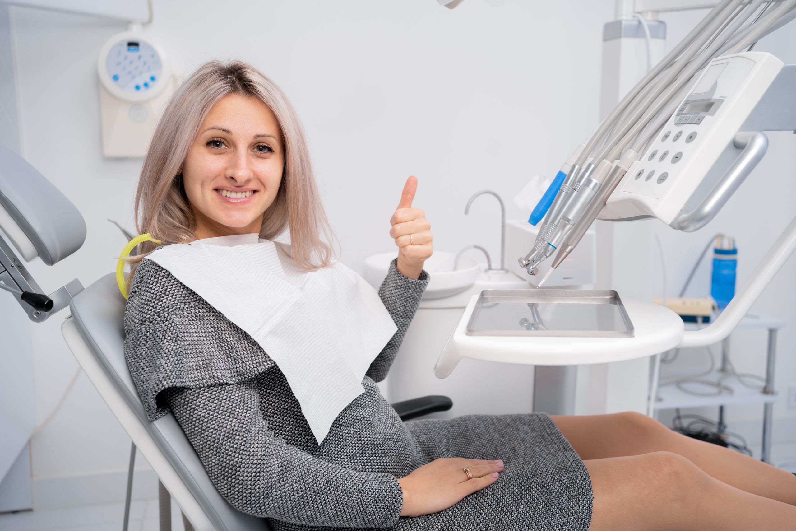 Patient smiling after implant-supported dentures at North Creek Dental Care in Tinley Park