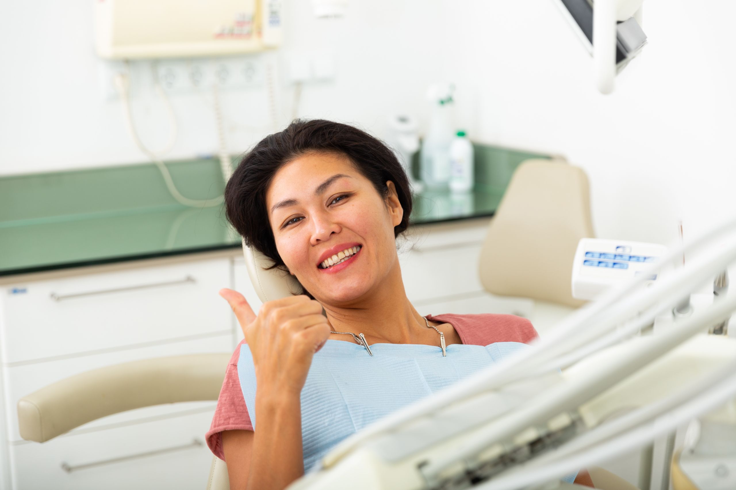 Patient smiling after dental implant treatment at North Creek Dental Care in Tinley Park