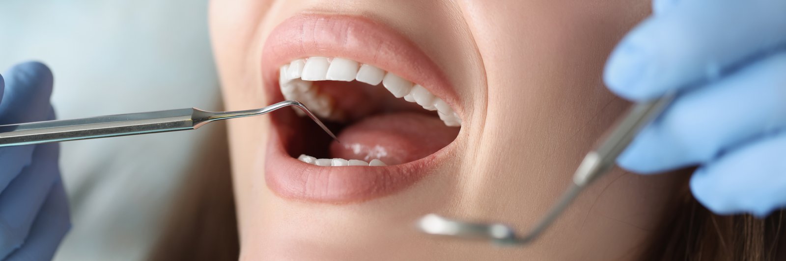 Patient smiling comfortably during a cosmetic dentistry consultation