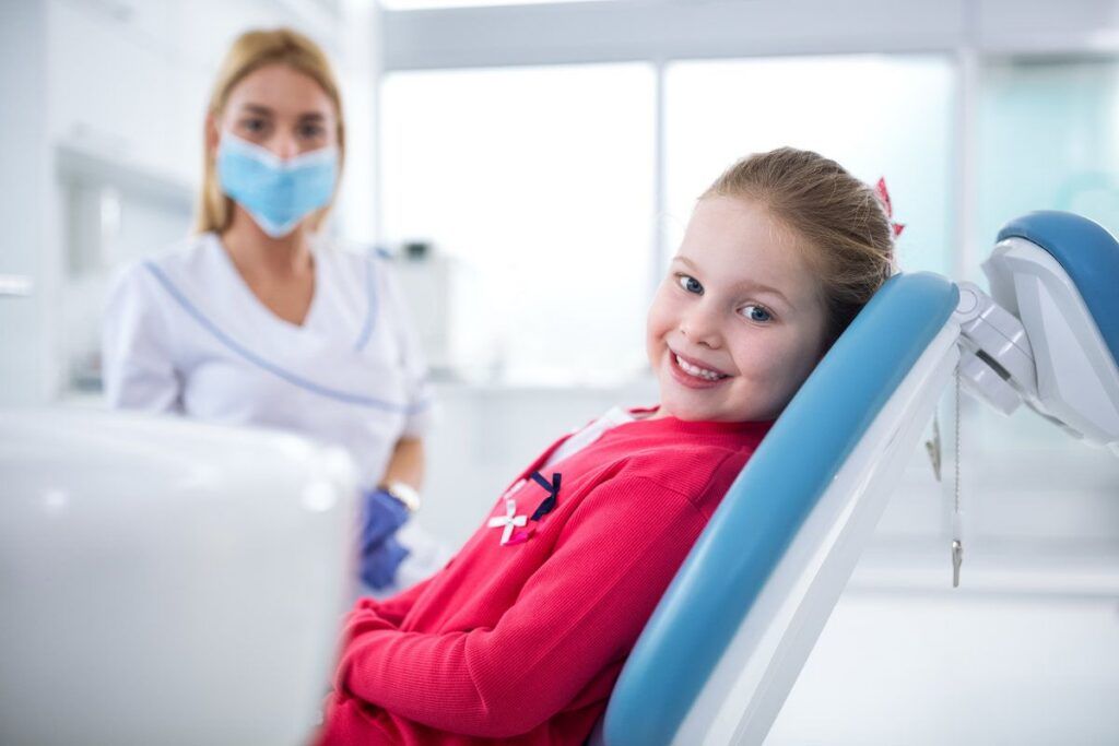 Happy kid at dental clinic